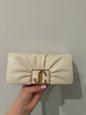 Jimmy Choo Cream Leather Wristlet Clutch with Gold JC Logo